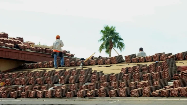 Roofers working on roof