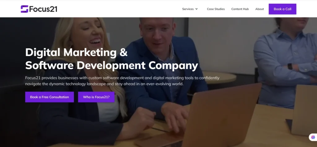"Focus21 homepage featuring the message 'Digital Marketing & Software Development Company.' The image shows a professional team collaborating on a digital project. Focus21 provides custom software development and digital marketing solutions to help businesses navigate the ever-changing technology landscape and stay competitive."
