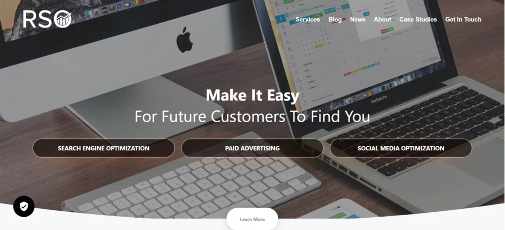 "RSO Consulting homepage displaying the tagline 'Make It Easy For Future Customers To Find You' with a workspace image featuring an iMac, MacBook Pro, and service buttons for SEO, Paid Advertising, and Social Media Optimization."