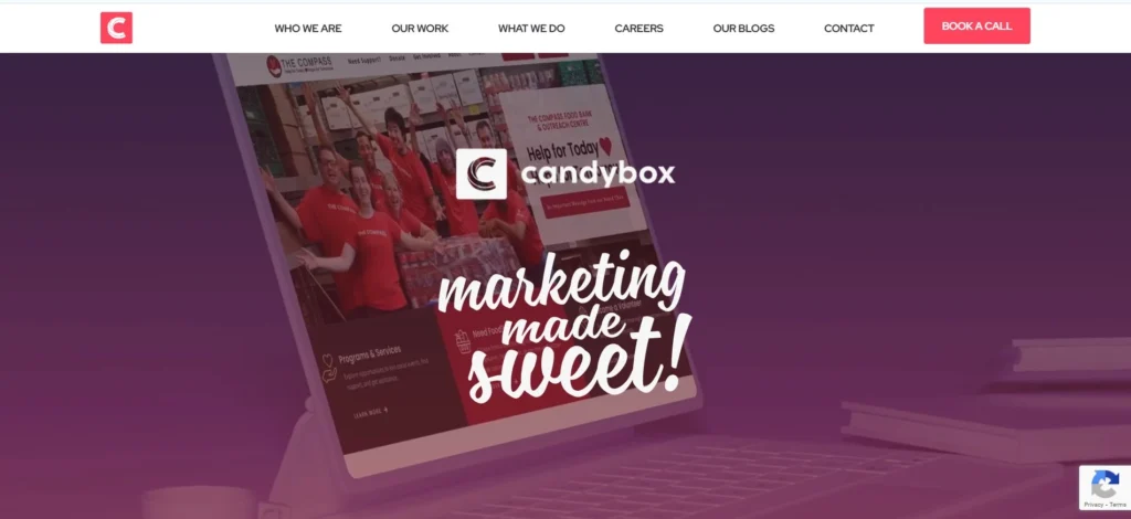 "Candybox Marketing homepage featuring the slogan 'Marketing Made Sweet' with a digital display of their nonprofit project work and bold call-to-action button."