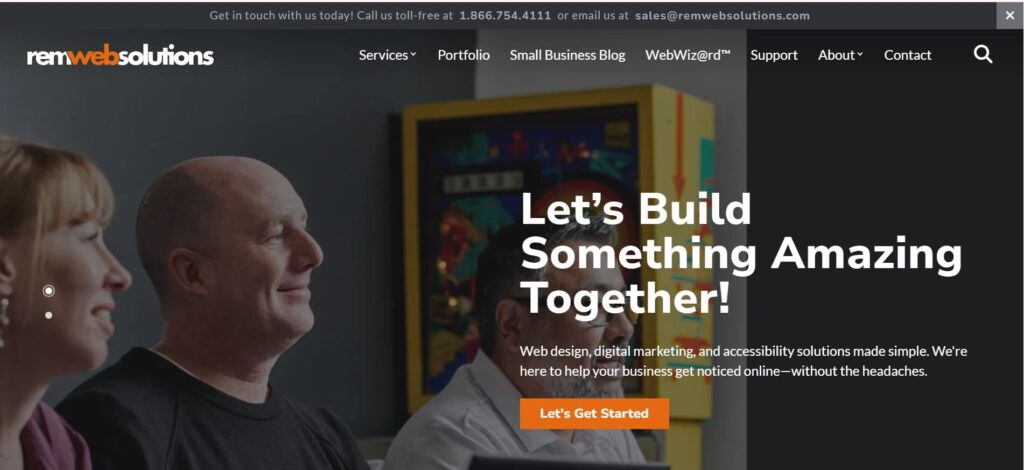 REM Web Solutions homepage with smiling team members and the tagline “Let’s Build Something Amazing Together.”