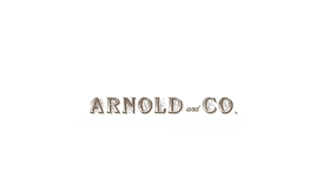 "Arnold and Co. logo featuring vintage-style serif typography in faded brown tones, giving a classic and rustic look."
