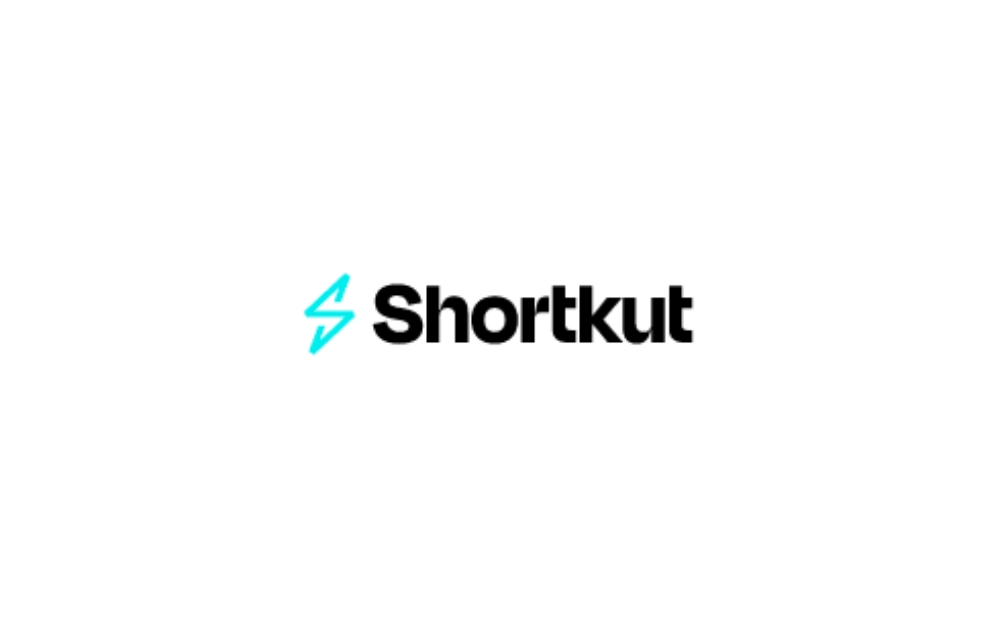 Shortkut agency logo with a bold black font and a turquoise electric 'S' symbol – a branding design for a growth-driven marketing solutions company.