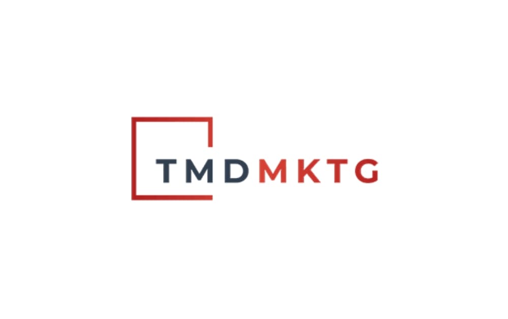TMD Marketing logo with red outlined square and bold text “TMD MKTG” in red and black — visual identity of a Winnipeg digital marketing agency known for PPC, social media, and creative strategy.