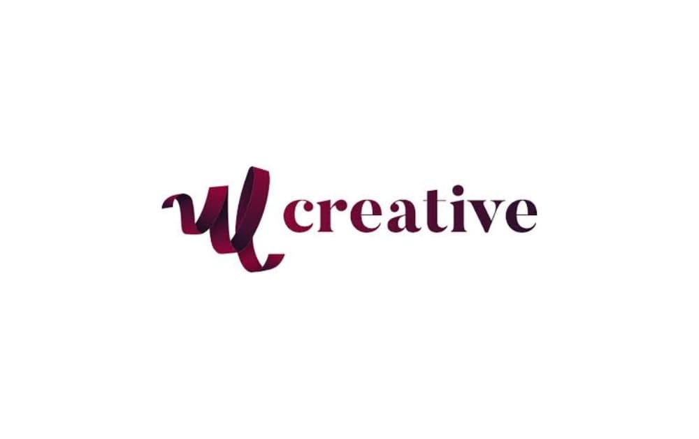 Logo of WECreative featuring a stylized maroon ‘W’ with the word ‘creative’ in lowercase, representing a modern Winnipeg-based digital marketing agency.