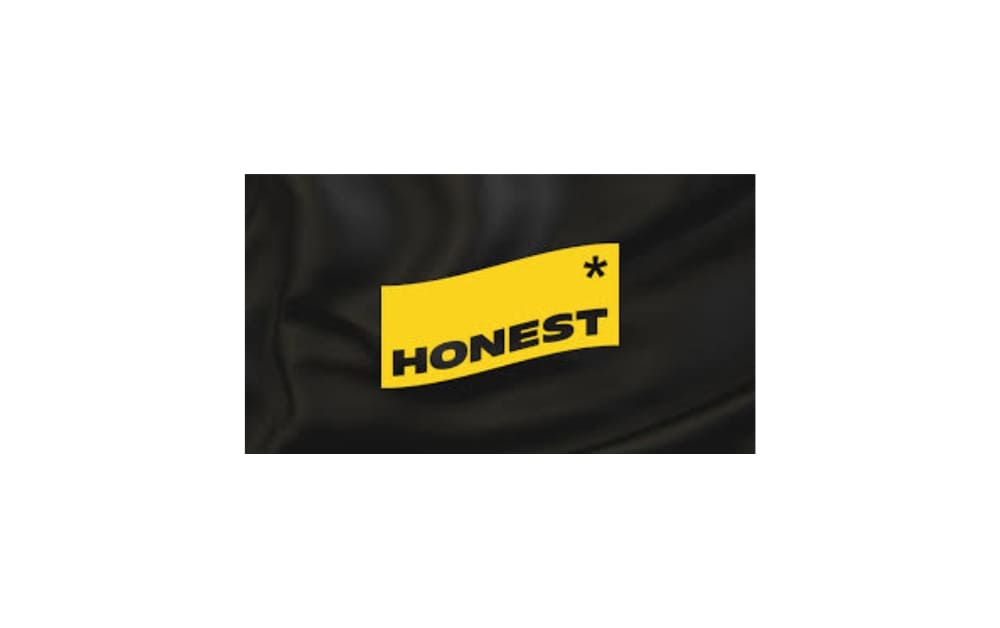 Logo of Honest Agency featuring the word “HONEST” in bold black text on a curved yellow flag shape with a black asterisk on a dark background.