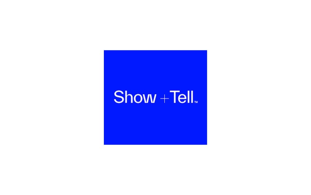 Logo of The Show and Tell Agency with the text “Show + Tell” in white on a bright blue square background.