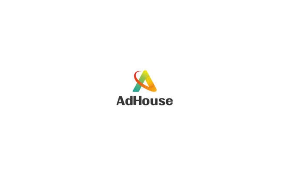 Logo of AdHouse featuring a stylized, ribbon-like “A” in red, orange, yellow, and green gradients, with black text below.