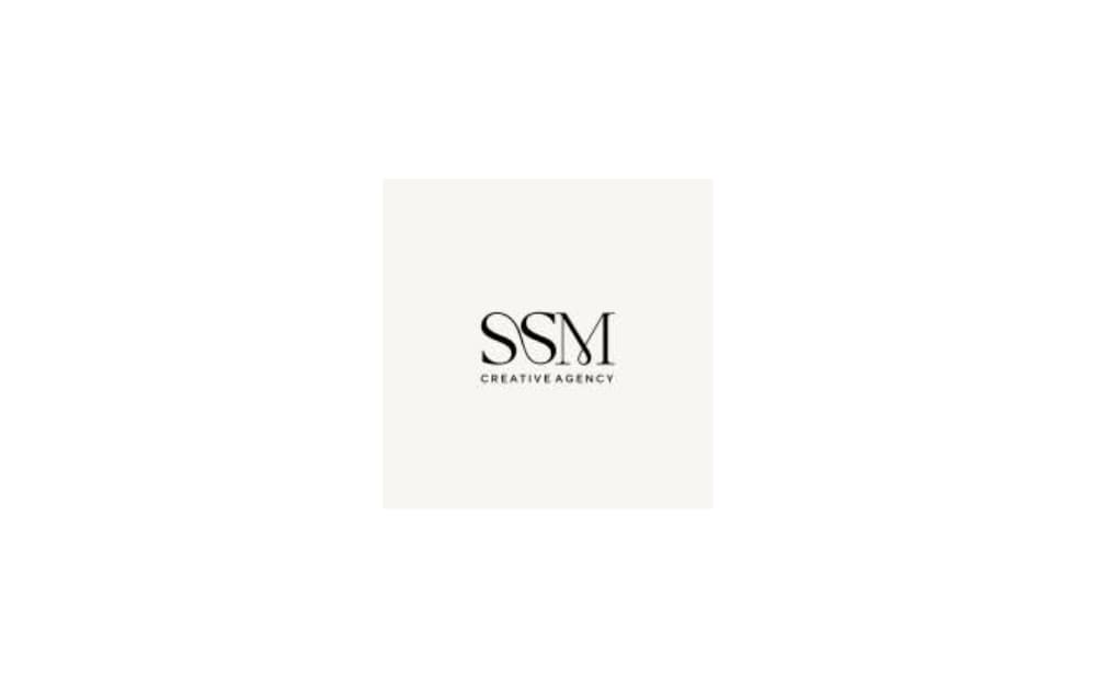 SSM Creative Agency logo with elegant black serif letters "SSM" and the subtitle “Creative Agency” on a light cream background.