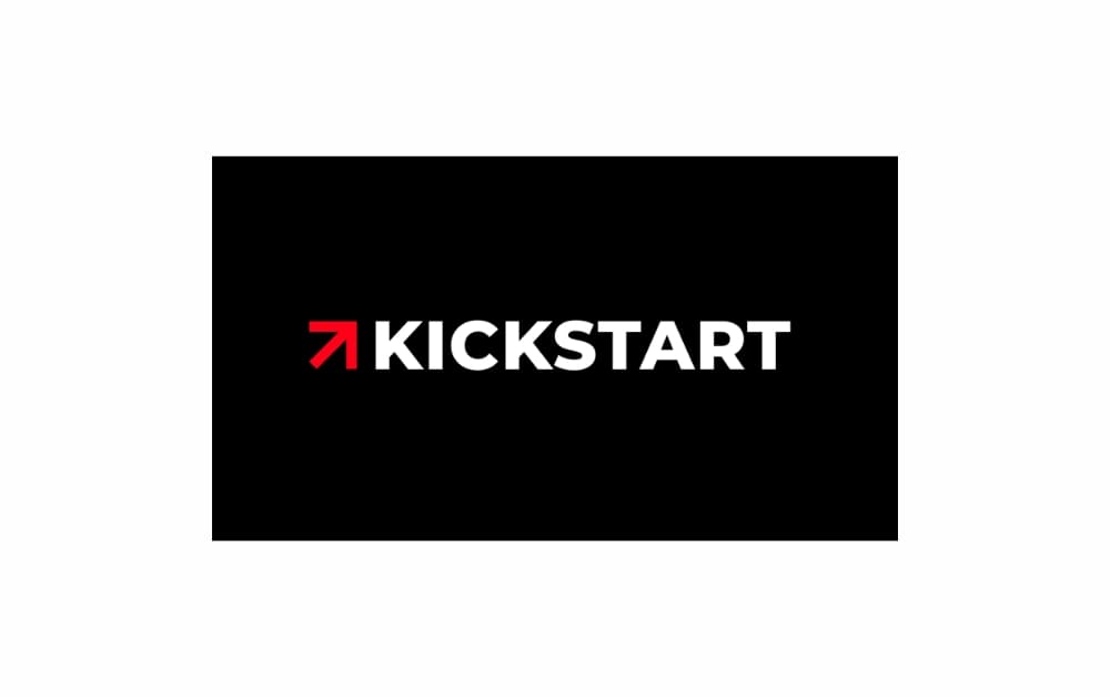 "Kickstart Logo: A bold and dynamic design with a red arrowhead leading into the word 'KICKSTART' in white uppercase letters on a black background, symbolizing the beginning of exciting new projects or initiatives."