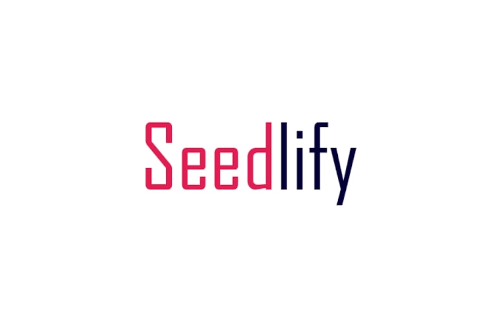 Seedlify logo with the brand name split in red and navy blue text, highlighting a tech-driven startup or marketing agency with a modern touch.