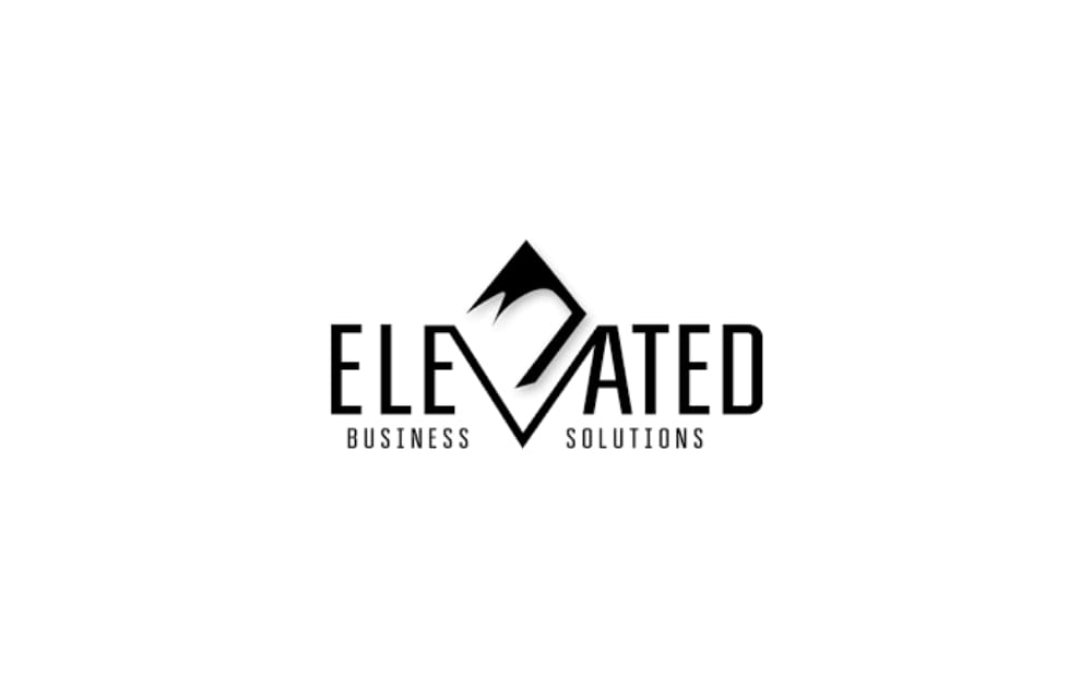 Elevated Business Solutions logo featuring a mountain-peak–shaped “V” within the word “ELEVATED” in bold black letters, symbolizing growth, strategy, and business development.