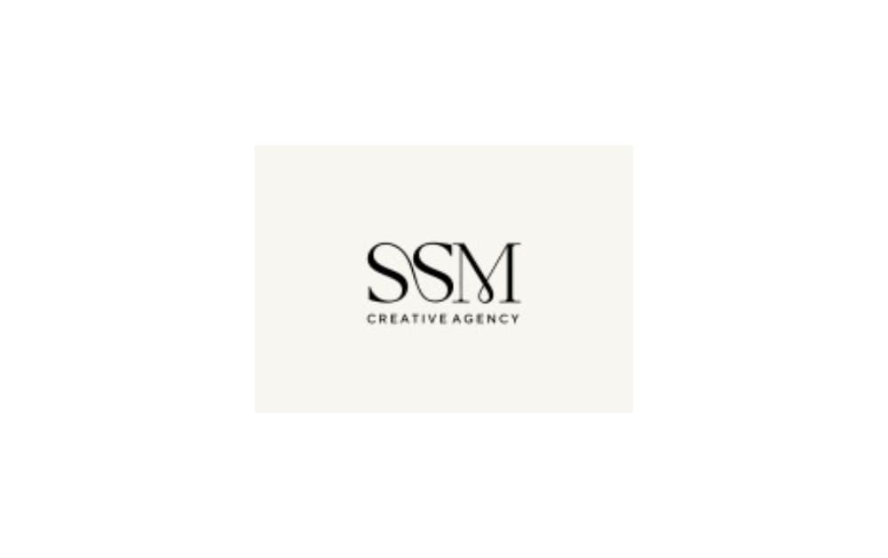 Elegant black and white logo for SSM Creative Agency, featuring stylized serif lettering and minimalist branding design.