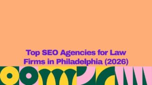 A graphic banner with a peach-colored background and bold purple text reading “Top SEO Agencies for Law Firms in Philadelphia (2026).” A colorful geometric pattern in green, yellow, pink, and dark teal decorates the bottom border of the image.